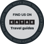 A circular badge with the text FIND US ON KAYAK Travel guides in the center, surrounded by a dark border that repeatedly says KAYAK TRAVEL GUIDE..